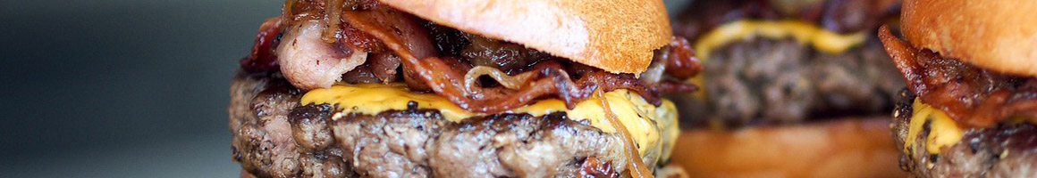 Eating Burger at Pickle's Burger and Shake restaurant in Santa Rosa Beach, FL.